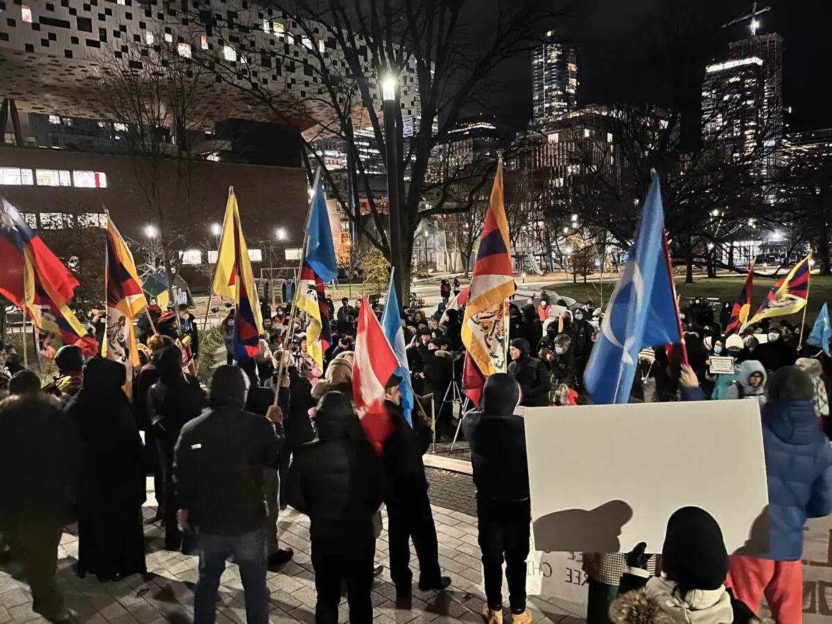 Hundreds of protesters gather at Grange Park in downtown Toronto on Dec. 3, 2022, in support of mass demonstrations in China against Beijing's draconian "zero-COVID" policy. (Roger Li/NTDTV)