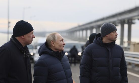 Russia’s Putin Drives Across Repaired Bridge to Crimea