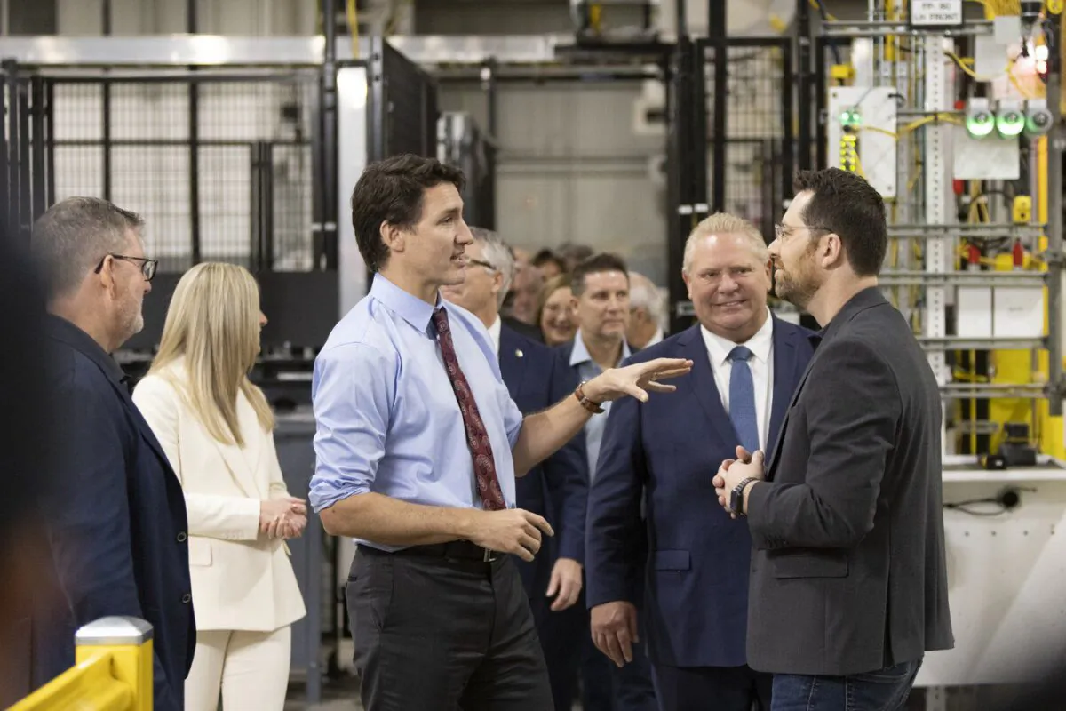 Prime Minister Justin Trudeau and Premier Doug Ford tour the General Motors CAMI assembly plant in Ingersoll, Ont., on Dec. 5, 2022. (The Canadian Press/Nicole Osborne)
