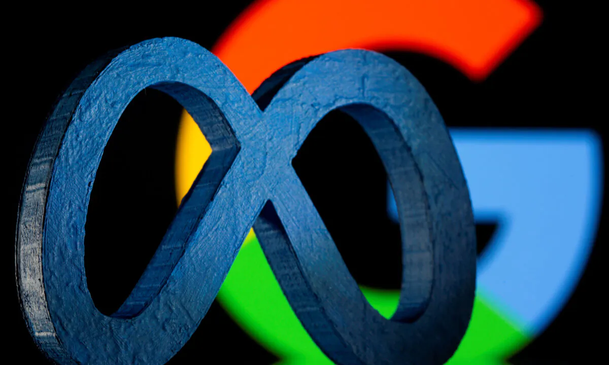 A 3D printed logo of Facebook's parent company Meta is seen in front of the Google logo in a illustration on Nov. 2, 2021. (Dado Ruvic/Reuters)