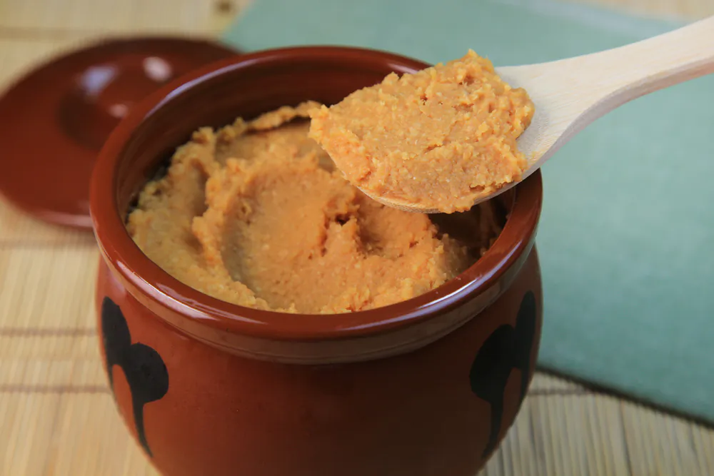 A fermented paste originating in Japanese cuisine, white miso tends to be lighter and sweeter in flavor than red miso. (studio presence/Shutterstock)