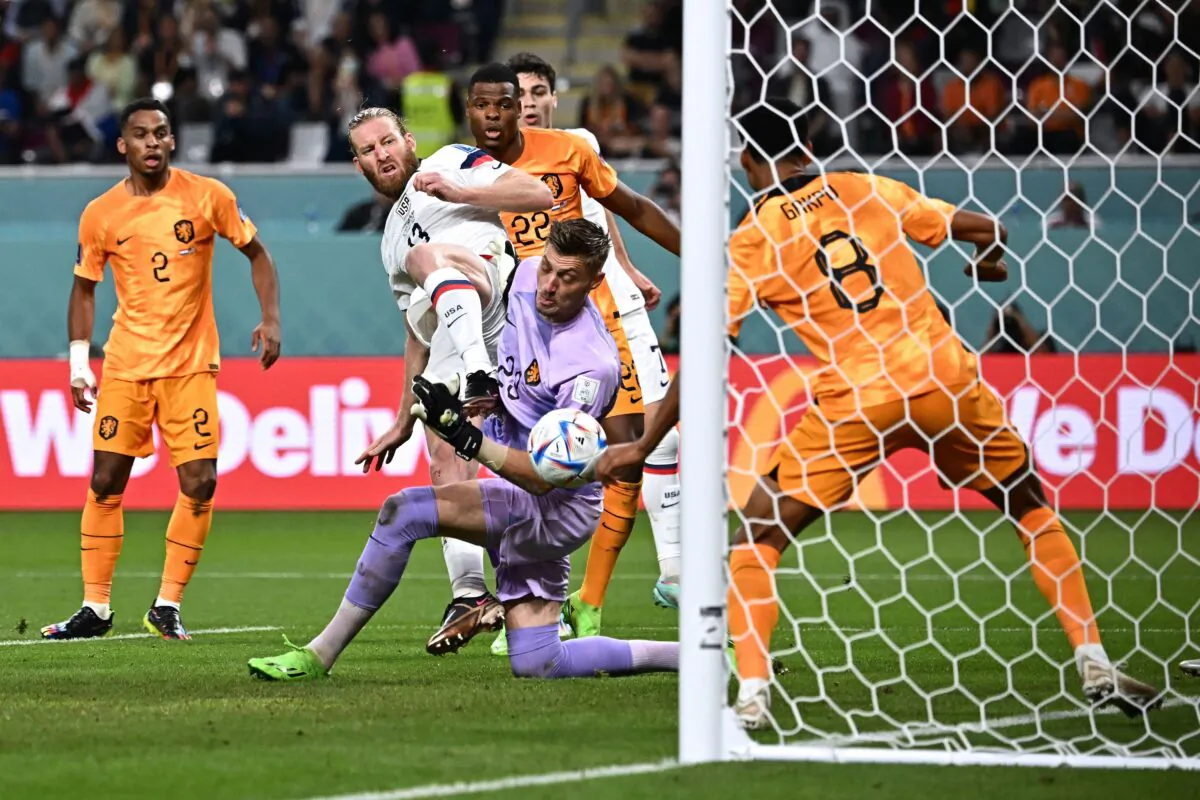 USA's defender (13) Tim Ream (C) attempts to score during the Qatar 2022 World Cup round of 16 football match between the Netherlands and USA at Khalifa International Stadium in Doha on Dec. 3, 2022. (Anne-Christine Poujoulat/AFP via Getty Images)