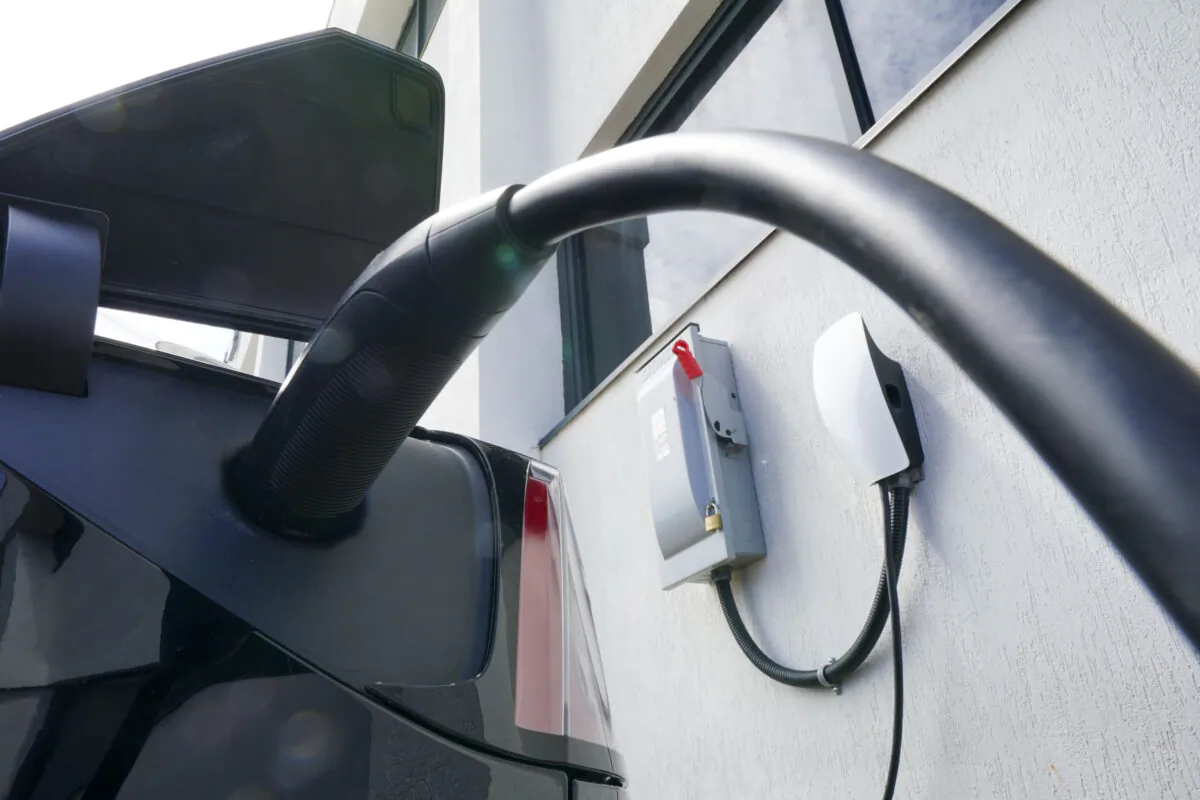 An electric vehicle is charged in Ottawa on July 13, 2022. (The Canadian Press/Sean Kilpatrick)