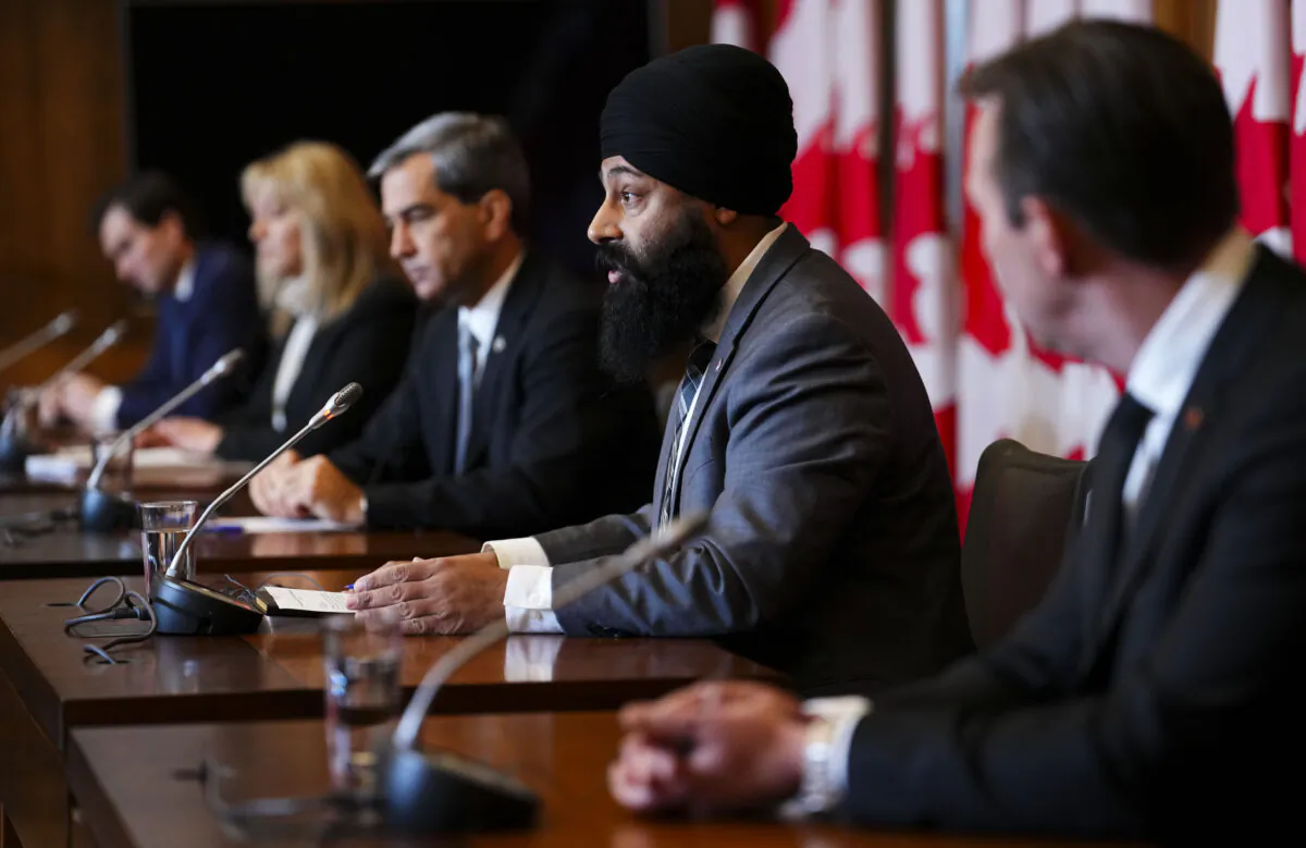 Conservative member of Parliament Jasraj Singh Hallan, second from right, joins fellow Conservative member's of Parliament for a press conference in response to the Auditor General report in Ottawa on Dec. 6, 2022. (Sean Kilpatrick/The Canadian Press)