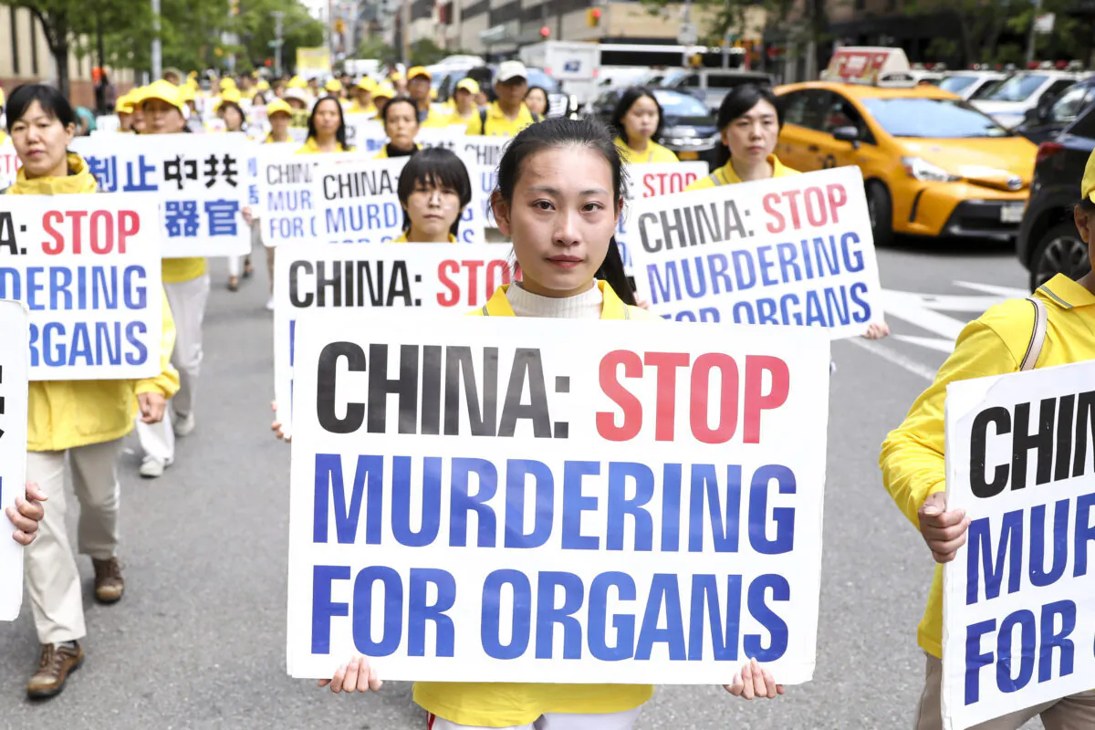 Falun Gong adherents parade in Manhattan, New York City, on May 16, 2019. (Samira Bouaou/The Epoch Times)