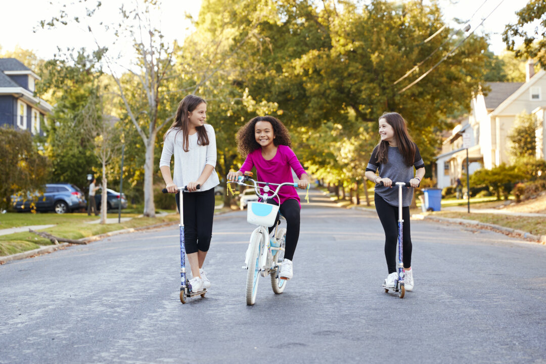 Young girls are hitting puberty at younger and younger ages. This does more than create health risks, it shortens their childhood and brings new stress to their lives.(Monkey Business Images/Shutterstock)