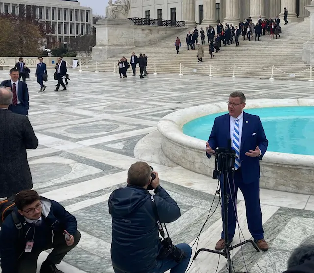 North Carolina House Speaker Rep. Timothy Moore (R-Cleveland) addresses the media Dec. 7 on the front steps of the U.S. Supreme Court in Washington. (John Haughey/The Epoch Times)