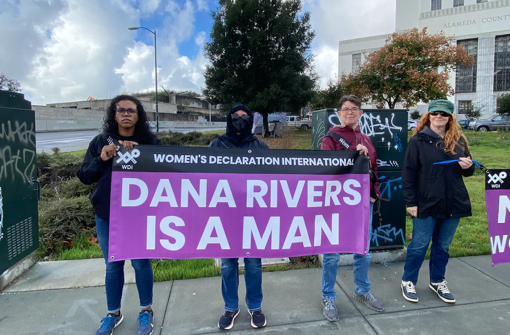 Women protest the possible transfer of convicted killer Dana Rivers—a biological male who identifies as female—to a women’s prison outside of the Alameda County Superior Courthouse in Oakland, Calif., on Dec. 5, 2022. (Courtesy of Women's Declaration International, U.S.A.)