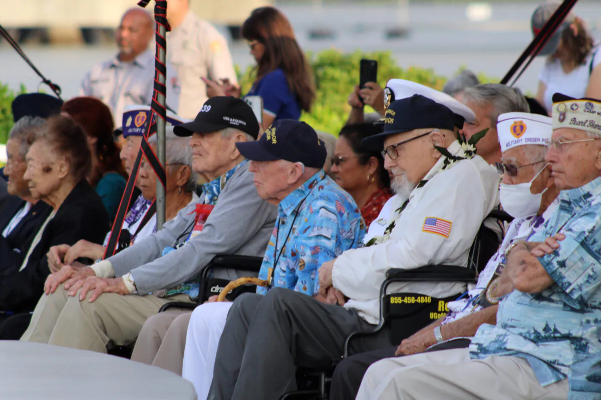 Pearl Harbor survivors and other military veterans observe a ceremony in Pearl Harbor, Hawaii, on Dec. 7, 2022, in remembrance of those killed in the 1941 attack. (Audrey McAvoy/AP Photo)