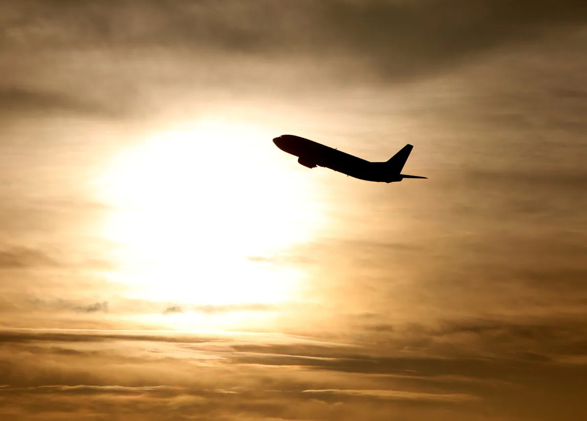 A plane during sunrise at the international airport in Munich on Jan. 9, 2018. (Michaela Rehle/Reuters)