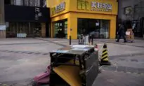 China Trade Shrinks Amid Virus Pressure, Interest Rate Hikes