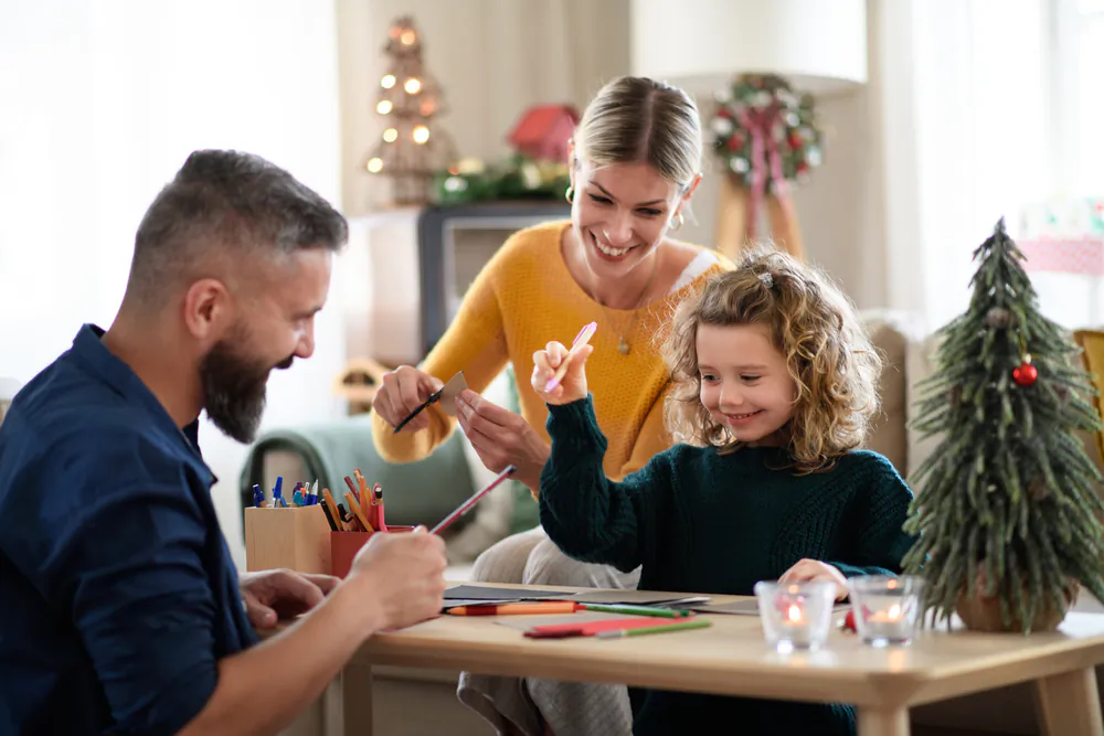 The best holiday traditions revolve around children; get them involved in crafting and channel their boundless energy into creative outlets. (Ground Picture/Shutterstock)
