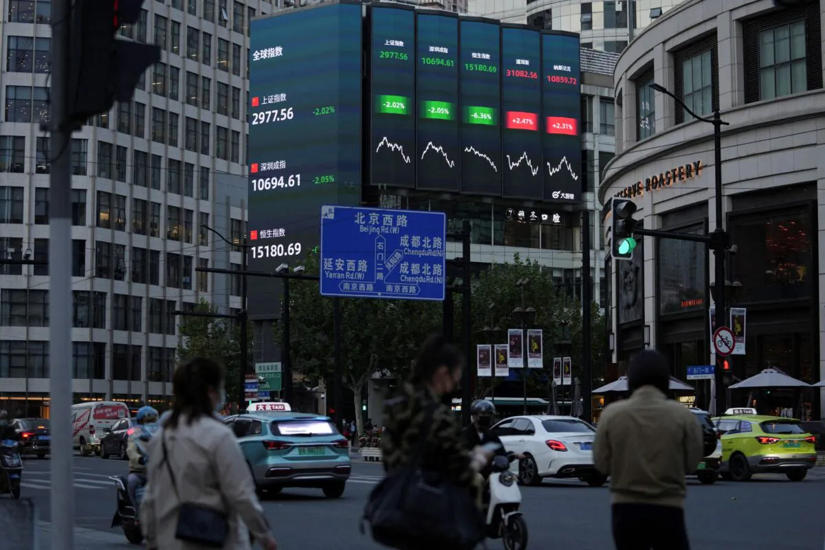 A view of a giant display of stock indexes in Shanghai, China, on Oct. 24, 2022. (Aly Song/Reuters)