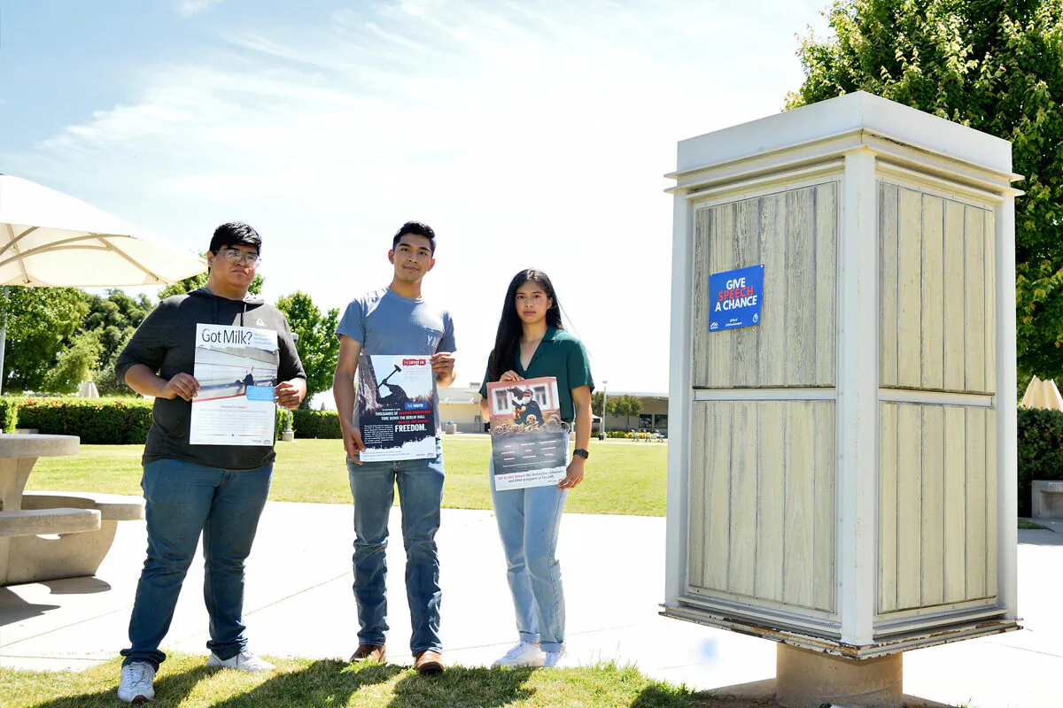 (L–R) Students Daniel Flores, Alejandro Flores, and Juliette Colunga hold flyers. (Courtesy of Alvarez Photography Studio)