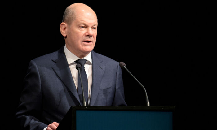 German Chancellor Olaf Scholz delivers his speech before he hands over the Marion Doenhoff Prize for international understanding and reconciliation to Russian Irina Sherbakova, co-founder of Russian rights group Memorial, during the award ceremony in Hamburg, Germany on Dec. 4, 2022. (Fabian Bimmer/Reuters)