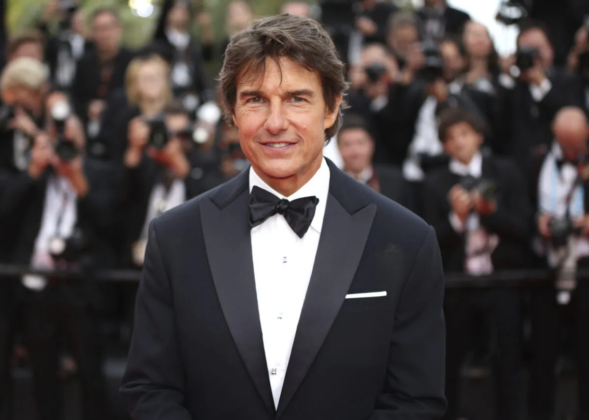 Tom Cruise appears at the premiere of the film "Top Gun: Maverick" at the 75th international film festival in Cannes, southern France, on May 18, 2022. (Vianney Le Caer/Invision/AP)