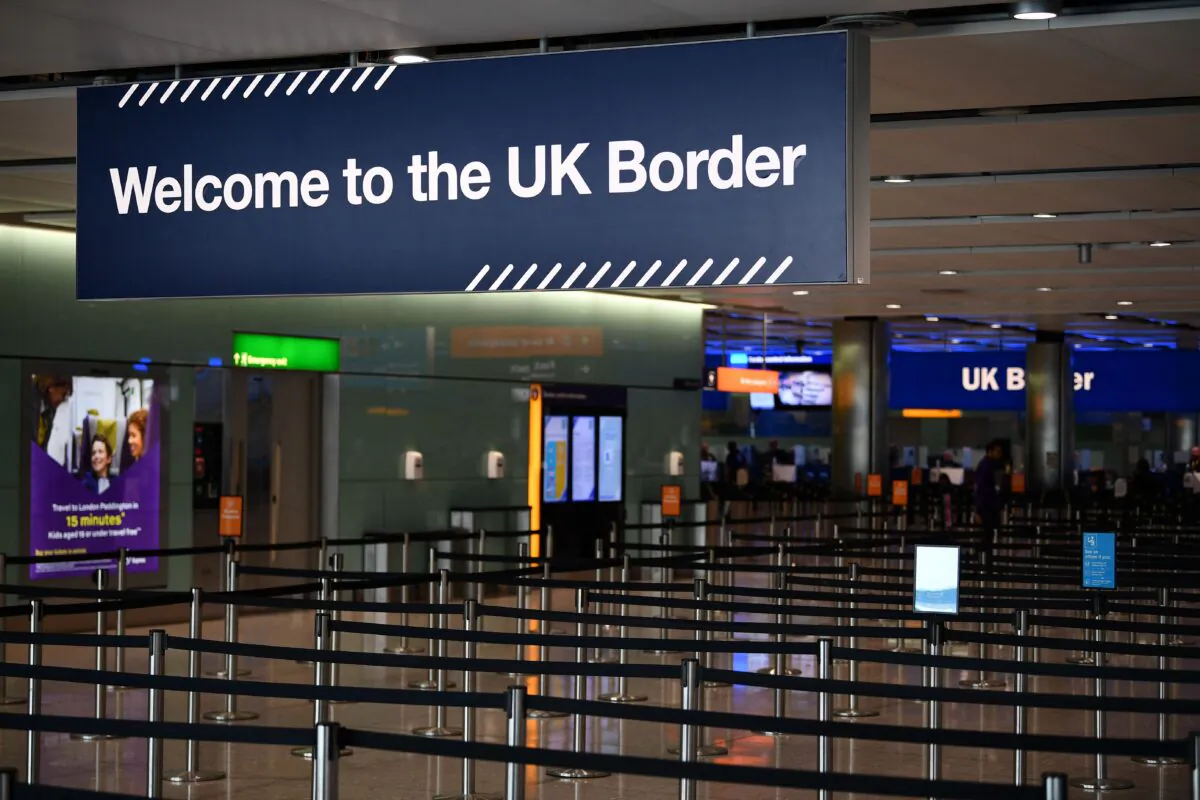 UK border signs are pictured at the passport control in Arrivals in Terminal 2 at Heathrow Airport in London on July 16, 2019. (Daniel Leal/AFP via Getty Images)