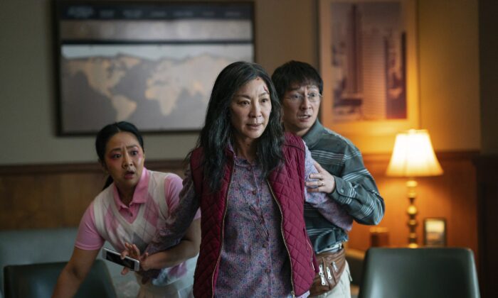 (L–R) Stephanie Hsu, Michelle Yeoh, and Ke Huy Quan in a scene from 