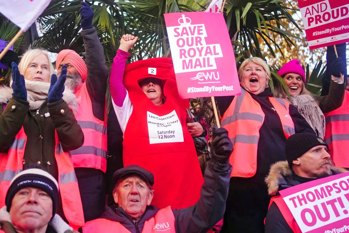 Members of the Communication Workers Union (CWU) hold a rally in Parliament Square, London, on Dec. 9, 2022. (Victoria Jones/PA Media)