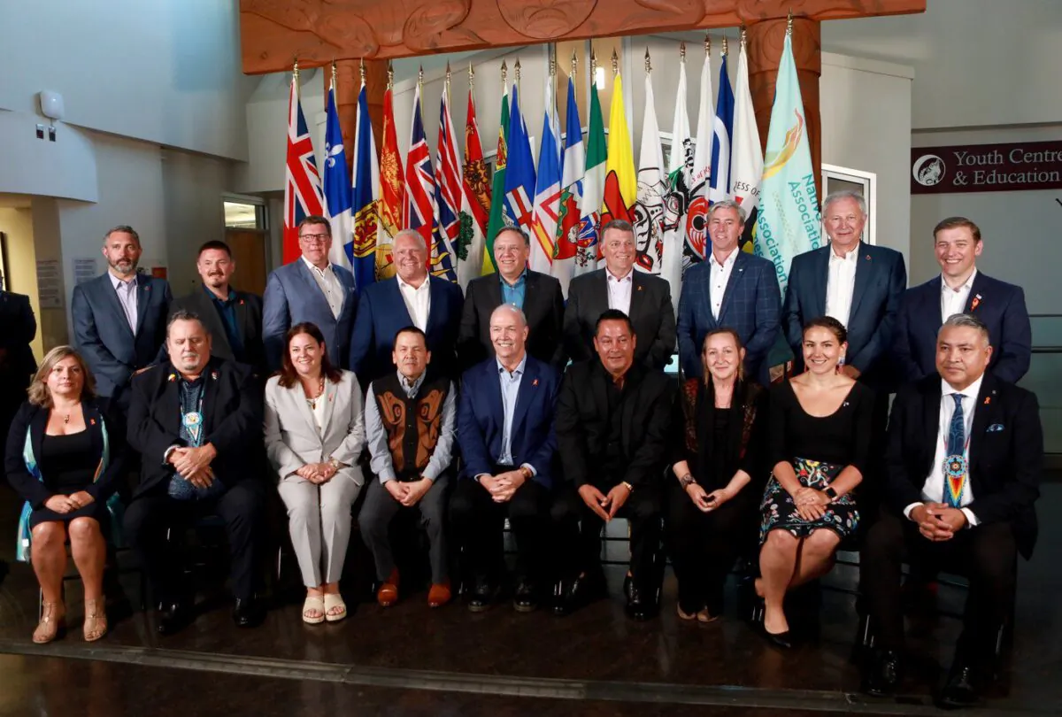 Premiers and First Nation leaders gather for a family photo during the summer meeting of the Canada's premiers at the Songhees Wellness Centre in Victoria, B.C., on July 11, 2022. (The Canadian Press/Chad Hipolito)
