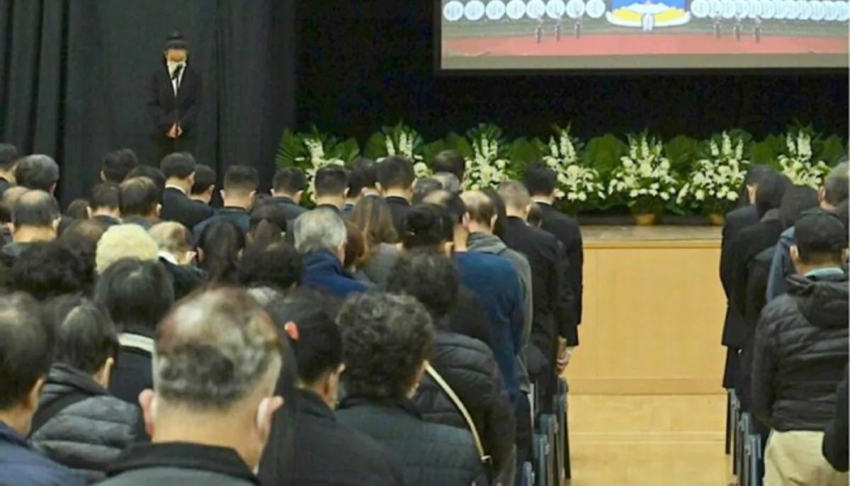 Photo of a live stream broadcast of the mourning of Jiang Zimin service at the Sau Mau Ping Community Hall. (Government Information Service)