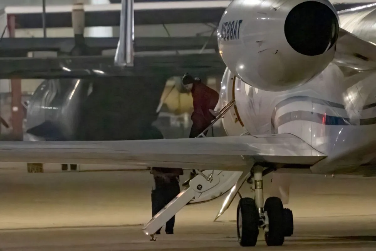 American basketball star Brittney Griner gets out of a plane after landing at the JBSA-Kelly Field Annex runway in San Antonio on Dec. 9, 2022. (Suzanne Cordeiro/AFP via Getty Images)