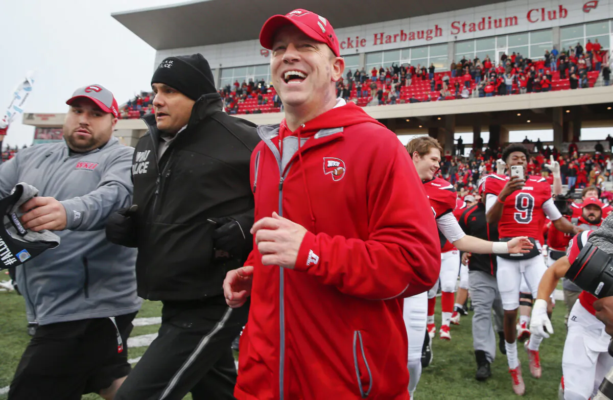 Head coach Jeff Brohm of the Western Kentucky Hilltoppers runs on the field following the game against the Louisiana Tech Bulldogs as Western Kentucky defeated Louisiana Tech 58-44, at Houchens-Smith Stadium in Champaign, Illinois, on Dec. 3, 2016. (Michael Hickey/Getty Images)