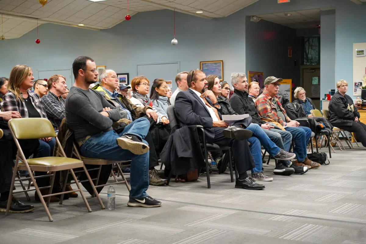 Attendees listen at the Wake Up to CCP Threat seminar in Middletown, N.Y., on Dec. 8, 2022. (Cara Ding/The Epoch Times)