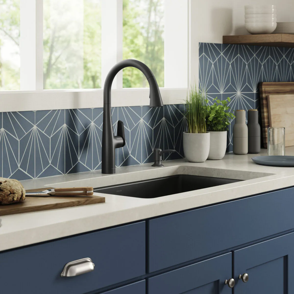 A pull-down kitchen faucet with a high arching spout can look a little more contemporary than a pullout faucet. (Kohler/TNS)
