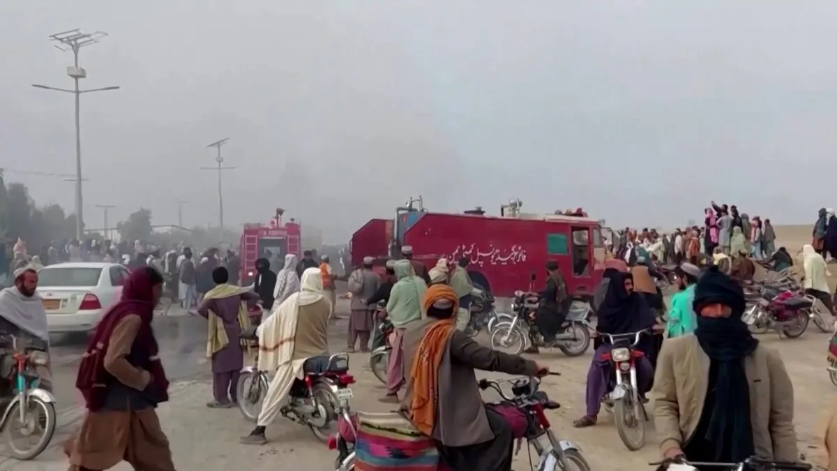 People at the scene of a cross-border shelling between Afghanistan and Pakistan in this image taken from video on Dec. 11, 2022. (Reuters/Screenshot via The Epoch Times)