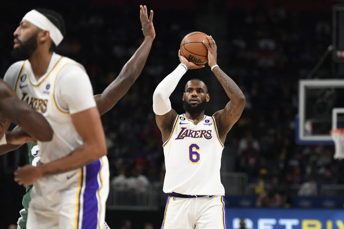 Los Angeles Lakers forward LeBron James (6) looks to pass against the Detroit Pistons during the first half of an NBA basketball game, in Detroit, on Dec. 11, 2022. (Jose Juarez/AP Photo)