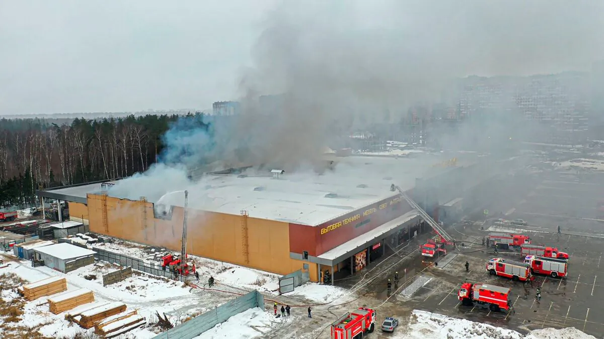 Smoke rises from the mall in Balashikha, just outside Moscow on Dec. 12, 2022. (Russian Emergency Ministry Press Service via AP)