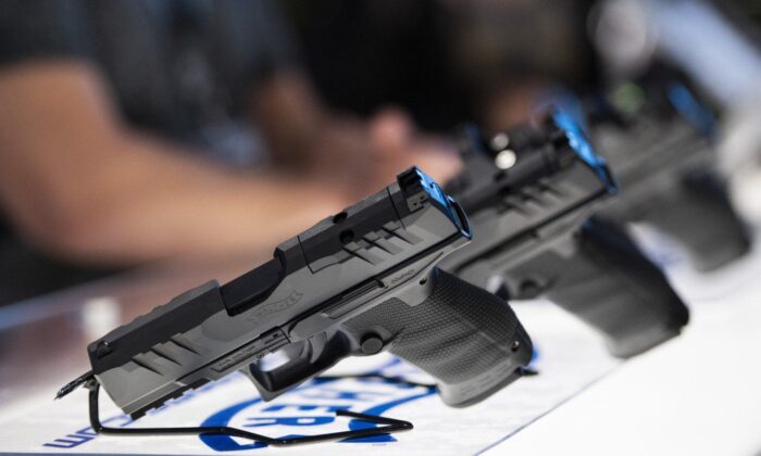A Walther PDP pistol is seen at the booth of an exhibitor that provides weapons to government, military and law enforcement clients, at the CANSEC trade show in Ottawa, on June 1, 2022. (The Canadian Press/Justin Tang)
