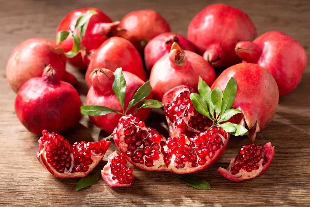 Native to Iran, Afghanistan, and the Himalayas, pomegranates have inserted themselves inextricably into the local cuisines and cultures. (Nitr/Shutterstock)