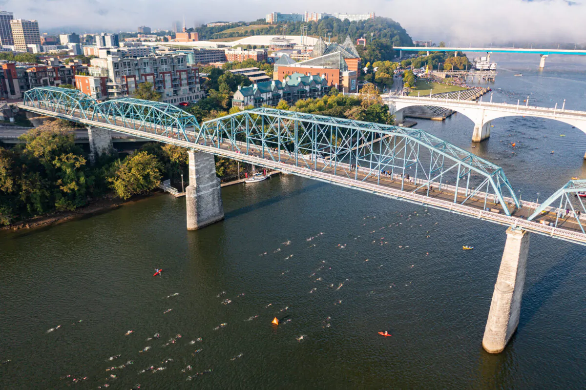 Athletes compete in the swim portion during the Ironman triathlon, in Chattanooga, Tenn., on Sept. 20, 2021. (Jacob Kupferman/Getty Images for Ironman)