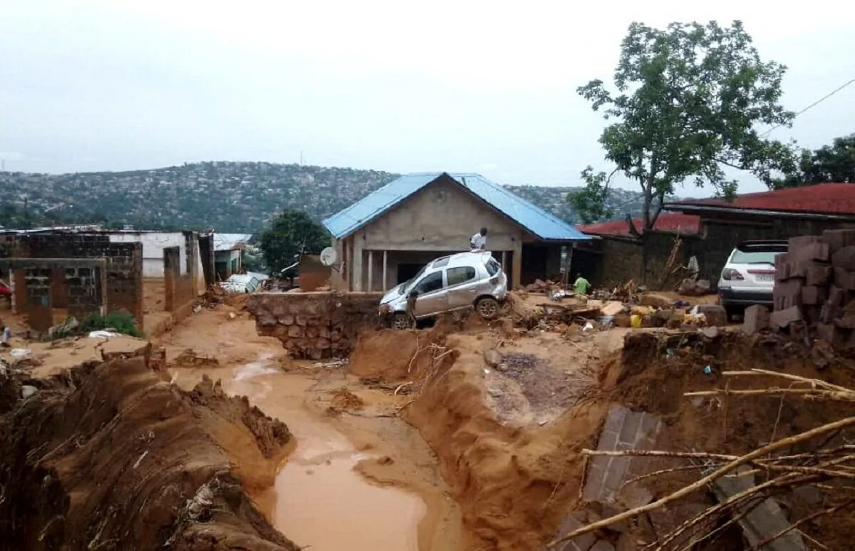 A car is seen after heavy rains caused floods and landslides, on the outskirts of Kinshasa, Democratic Republic of Congo, on Dec. 13, 2022. (Stringer/Reuters)