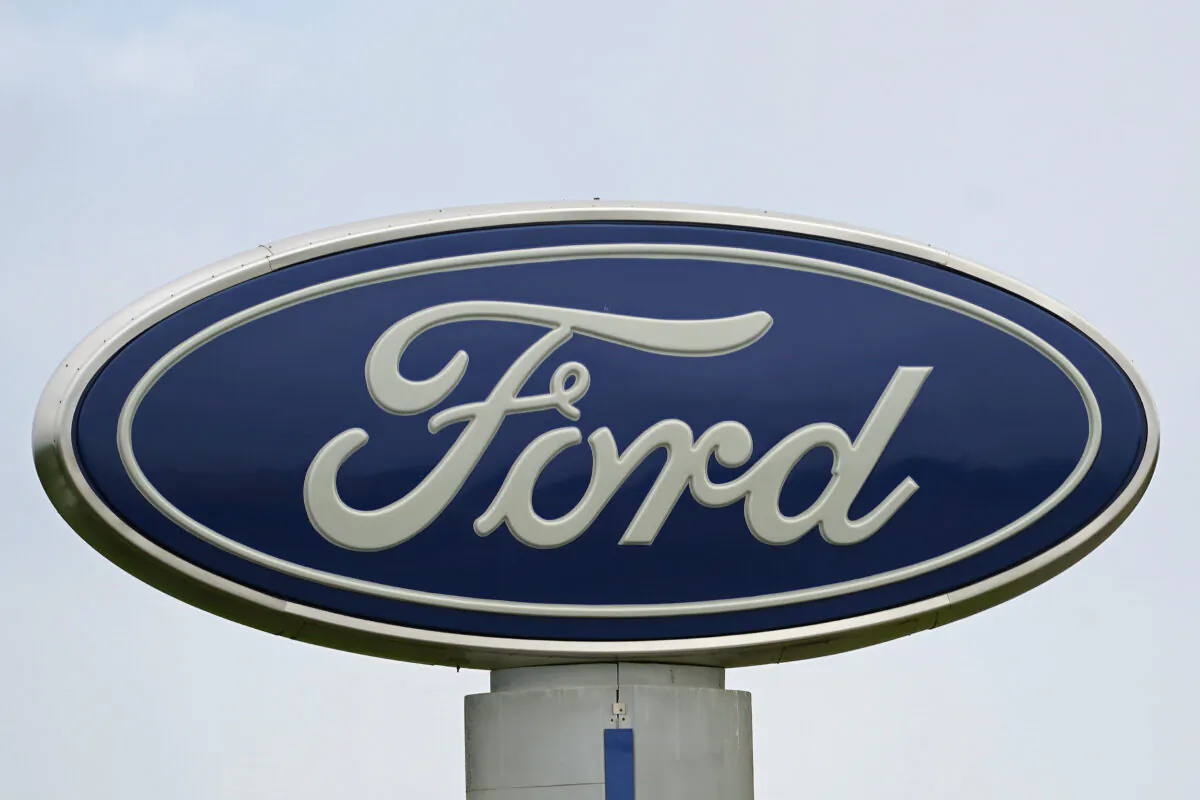 A Ford logo on signage at Country Ford in Graham, N.C., on July 27, 2021. (Gerry Broome/AP Photo)
