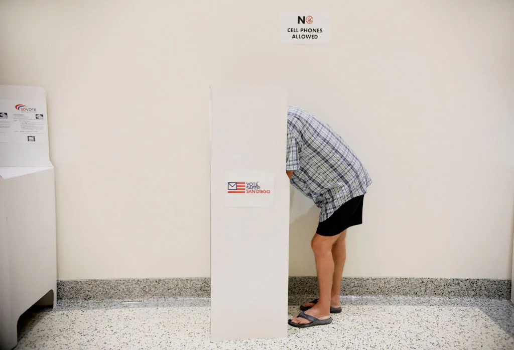 A voter casts his ballot at the San Diego County Registrar of Voters in San Diego on Oct. 5, 2020. (Sandy Huffaker/AFP via Getty Images)