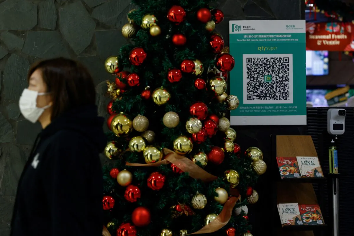 A QR code for the "LeaveHomeSafe" COVID-19 contact-tracing app inside a shopping mall in Hong Kong on Dec. 13, 2022. (Tyrone Siu/Reuters)