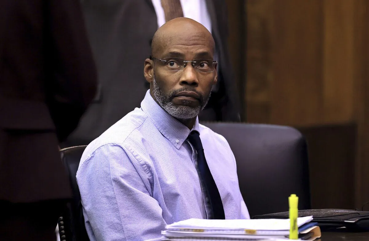 Lamar Johnson takes a seat in court at the start of his wrongful conviction hearing in St. Louis on Dec. 12, 2022. (David Carson/St. Louis Post-Dispatch via AP, Pool)
