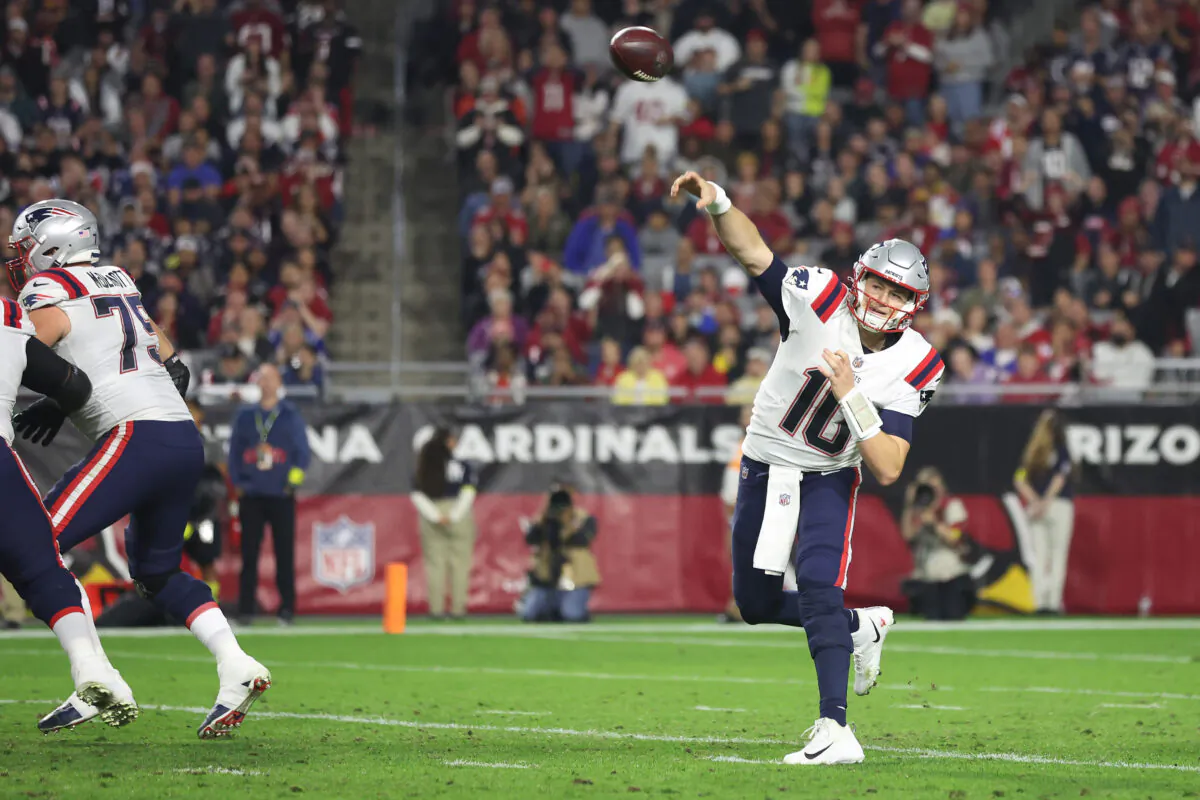 Mac Jones (10) of the New England Patriots throws a pass against the Arizona Cardinals during the second quarter of the game at State Farm Stadium in Glendale, Ariz., on Dec. 12, 2022. (Christian Petersen/Getty Images)