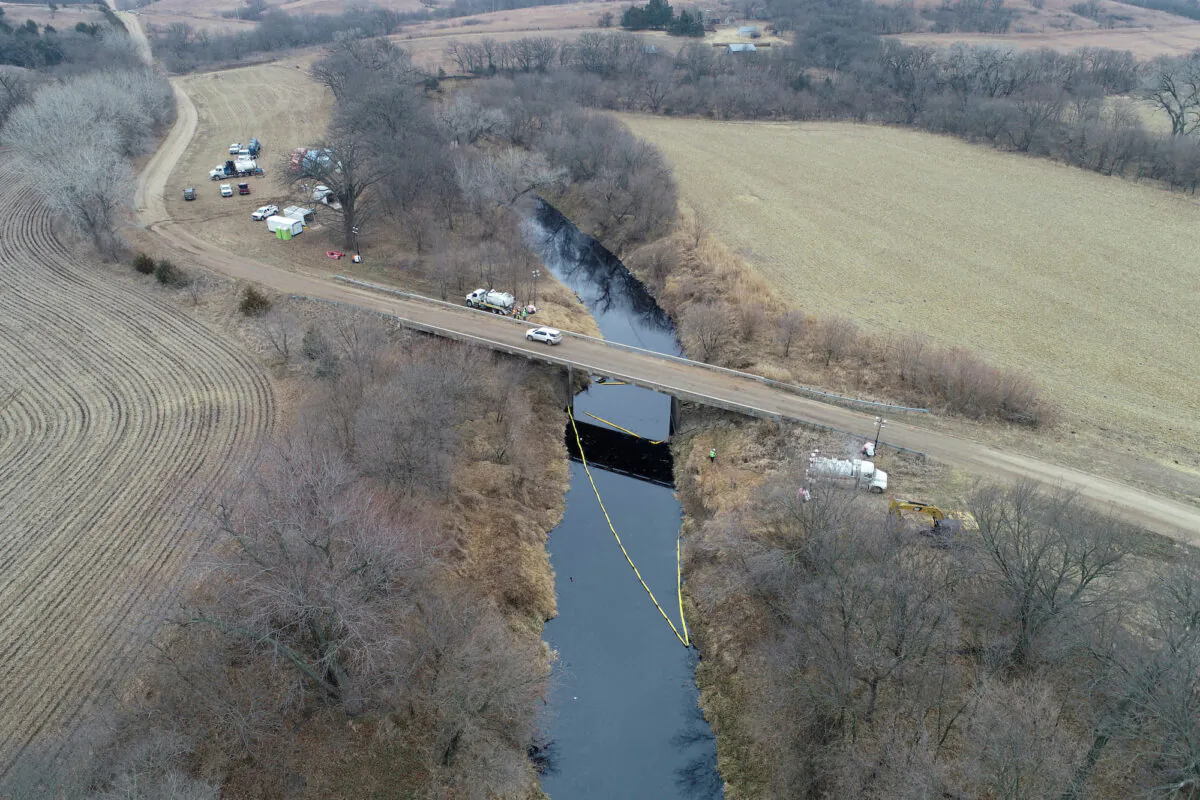 Emergency crews work to clean up the Keystone Pipeline spill operated by TC Energy in rural Washington County, Kansas, on Dec. 9, 2022. (Drone Base/Reuters)