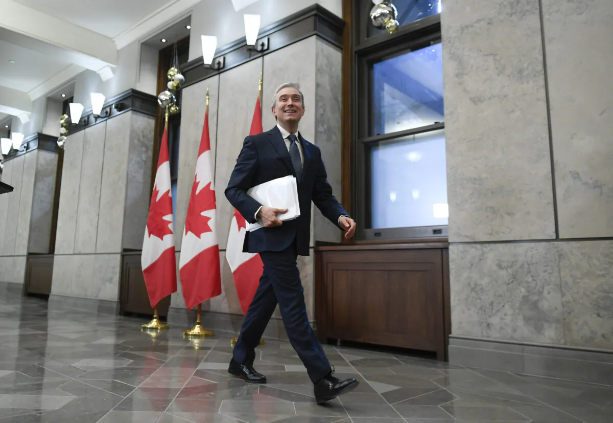 Minister of Innovation, Science and Industry François-Philippe Champagne leaves after a media availability on Parliament Hill in Ottawa on Dec. 7, 2022. (The Canadian Press/Justin Tang)