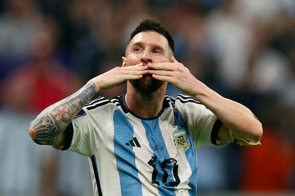 Argentina's Lionel Messi celebrates after Julian Alvarez scores their third goal in the match of Argentina versus Croatia, during the FIFA World Cup Qatar 2022 in Lusail Stadium, Lusail, Qatar, on Dec. 13, 2022. (Kai Pfaffenbach/Reuters)