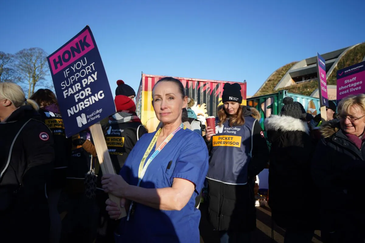 Members of the Royal College of Nursing on the picket line outside the Alder Hey Children's Hospital in Liverpool as nurses in England, Wales, and Northern Ireland take industrial action over pay, on Dec. 15, 2022. (Peter Byrne/PA Media)