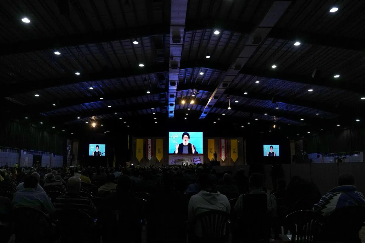 Hezbollah leader Sayyed Hassan Nasrallah speaks via a video link during a rally marking Hezbollah Martyr's Day, in the southern Beirut suburb of Dahiyeh, Lebanon, Nov. 11, 2022. (The Canadian Press/AP-Bilal Hussein)