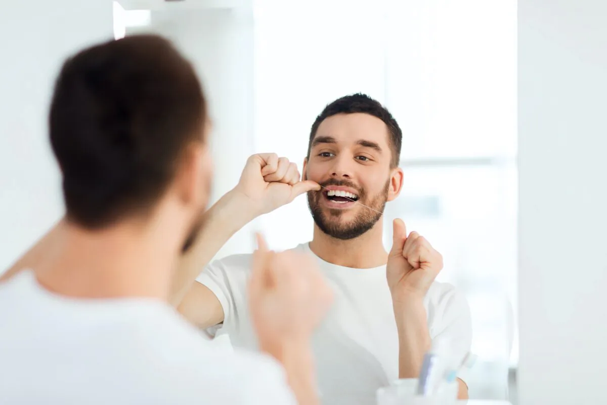 Maintenance is always a great strategy to help prevent costly problems down the line, including for your teeth! (Ground Picture/Shutterstock)