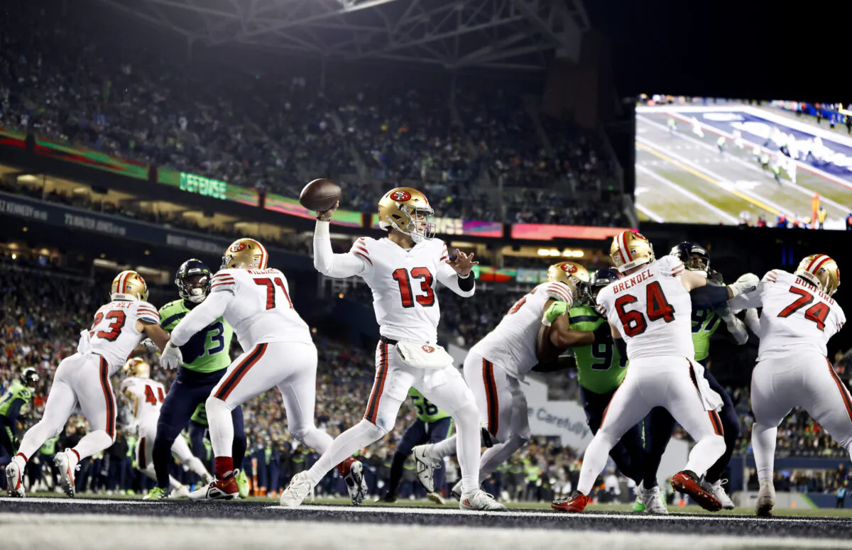 Brock Purdy (13) of the San Francisco 49ers throws a pass against the Seattle Seahawks during the fourth quarter of the game at Lumen Field in Seattle, on Dec. 15, 2022. (Steph Chambers/Getty Images)