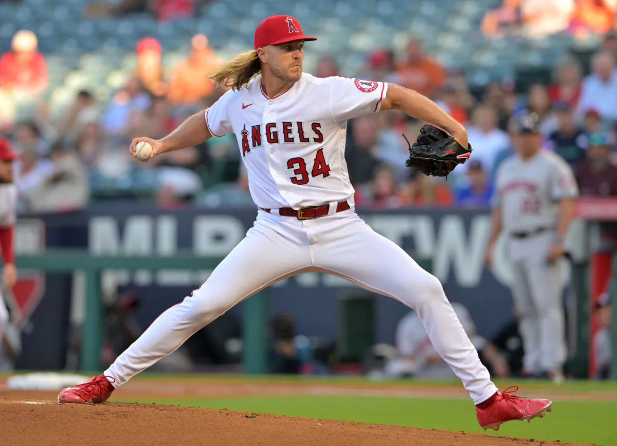 Noah Syndergaard (34) of the Los Angeles Angels pitches in the first inning against the Houston Astros at Angel Stadium of Anaheim in Anaheim, Calif., on July 12, 2022. (Jayne Kamin-Oncea/Getty Images)