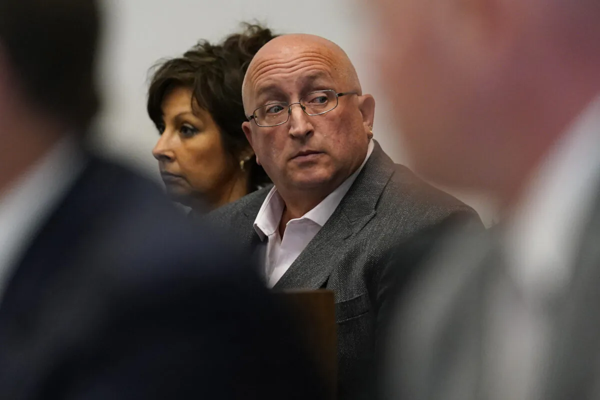 Robert E. Crimo III's father Robert Crimo Jr., (R), and mother Denise Pesina attend to a hearing for their son in Lake County court in Waukegan, Ill., on Aug. 3, 2022. (Nam Y. Huh/AP Photo, Pool)